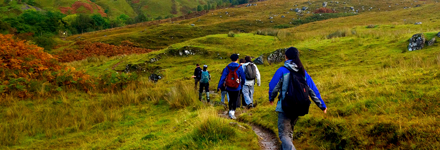 students hiking on a trip abroad